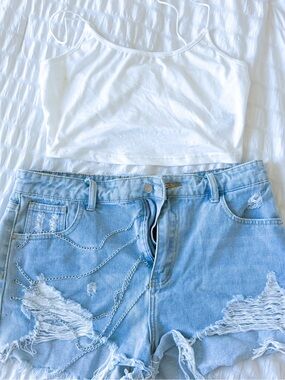 White Cropped Tank Top with Light Blue Distressed Denim Shorts